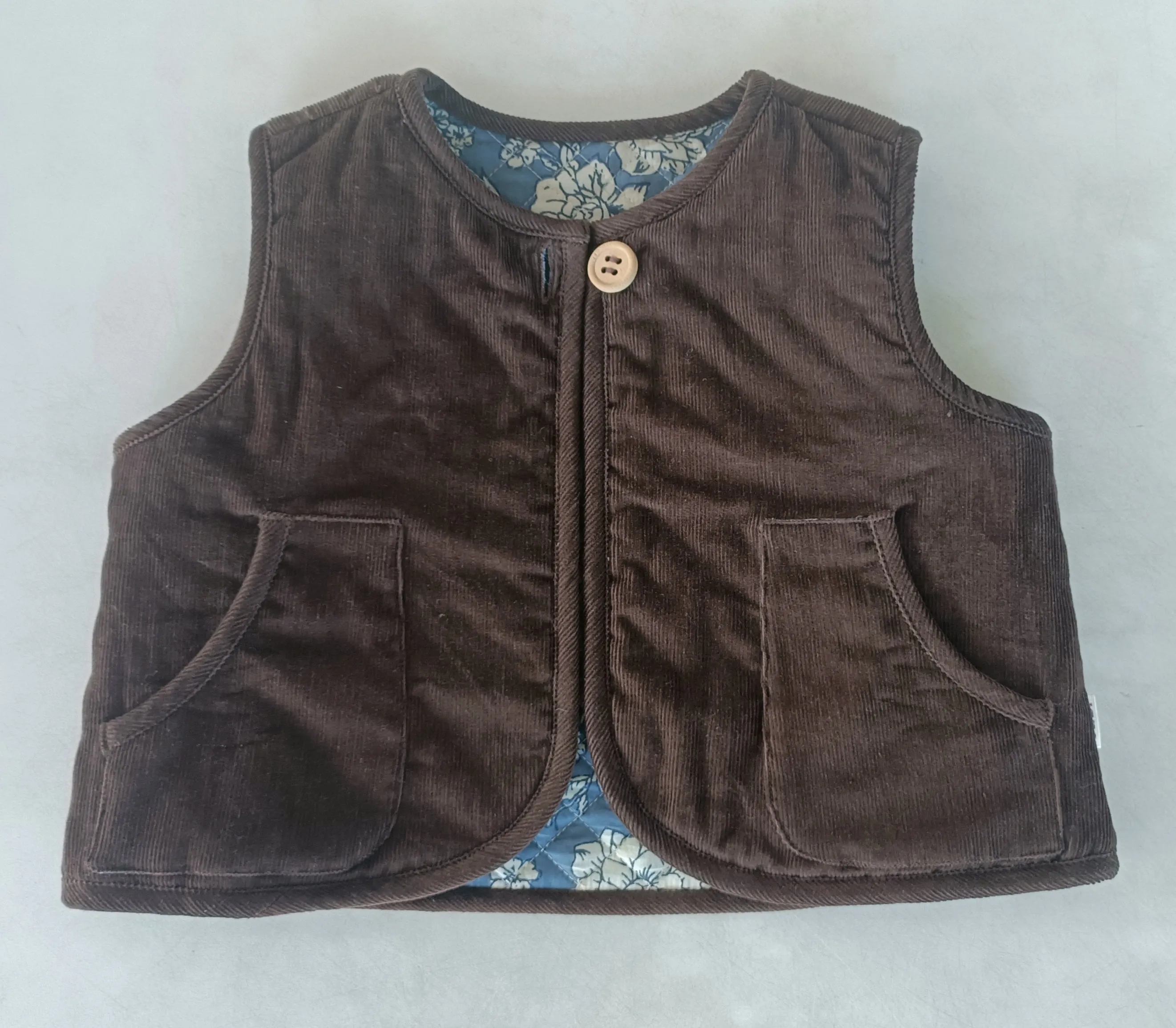 Reversible Chocolate Brown Corduroy & Grey Floral Print Quilted Sleeveless Jacket